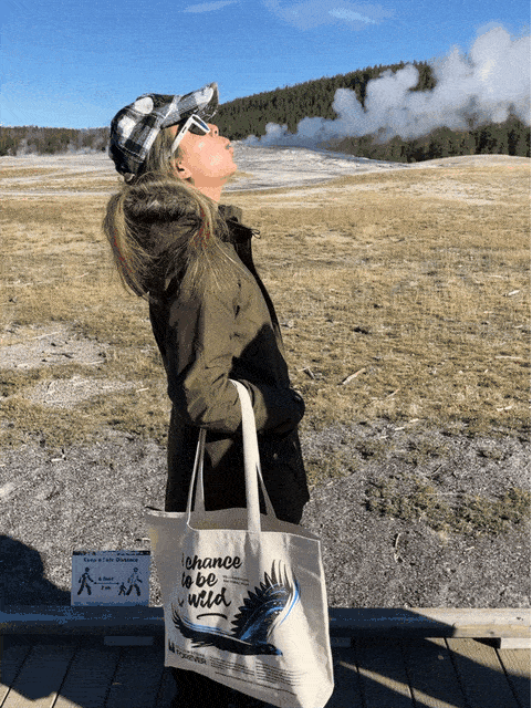 A photo of our team member Tran Pham on vacation at Yellowstone National Park